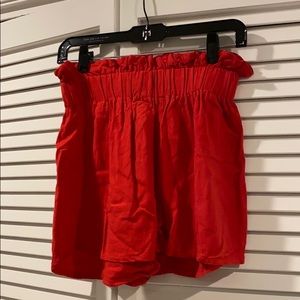 red flowy shorts